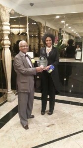 marie-claire and Williamsbridge NAACP Chapter president pose with award