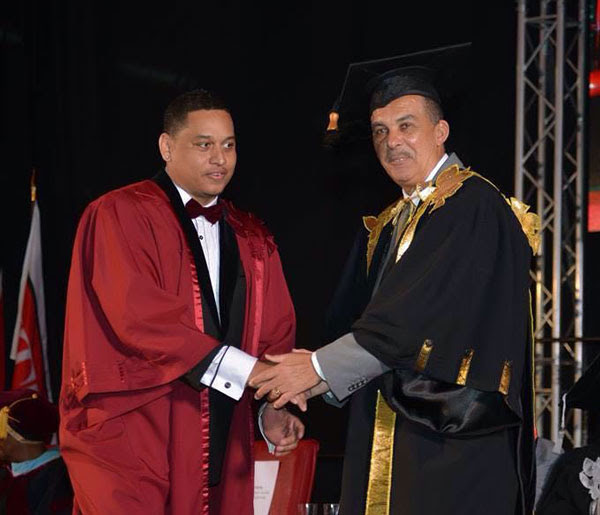 Derek Pereira receiving his university diploma from the President of Trinidad and Tobago, His Exellency Anthony Carmona.